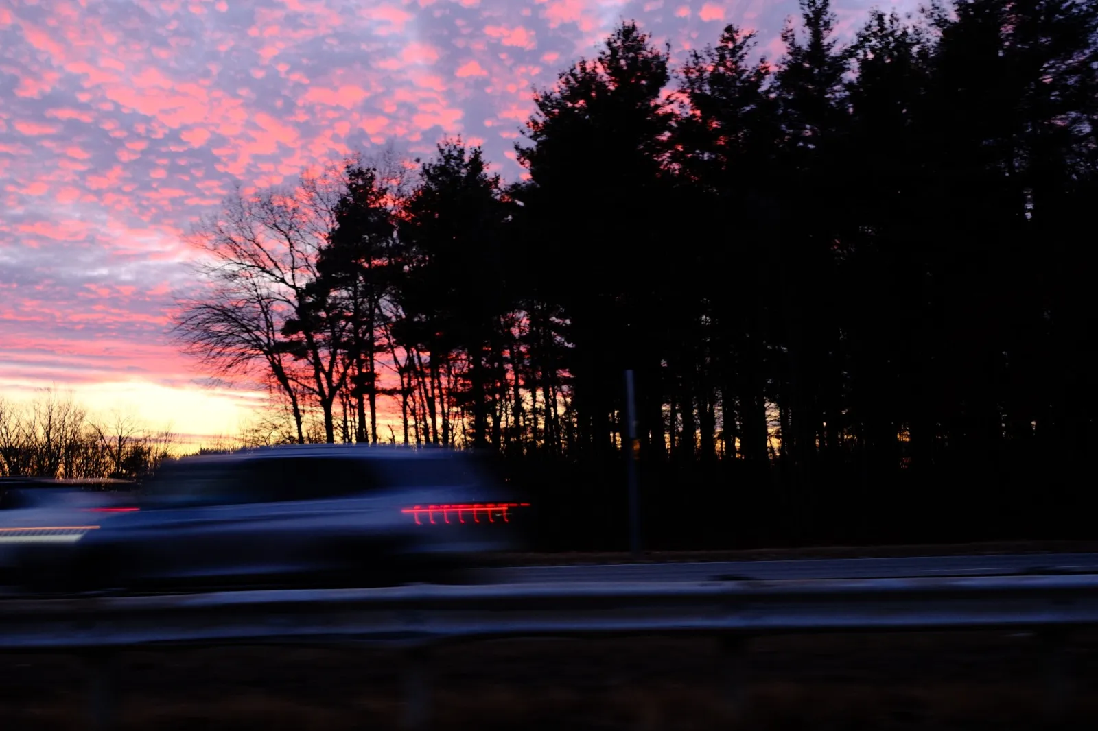 Sunset with motion blur car
